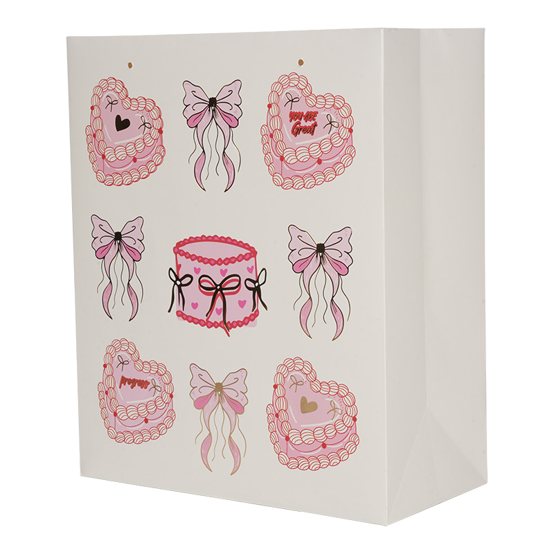 حقيبة هدايا مصورة على شكل كعكة قلب وردية للعطلات والهدايا